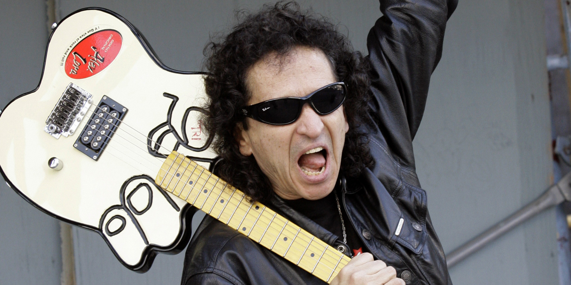 Alex Lora, lead singer of the legendary Mexican band El Tri, poses for a photo on Sunset Blvd., in Los Angeles, on Thursday, Oct. 16, 2008. El Tri will play on Saturday, Oct. 25, 2008 at the Nokia Theater, Los Angeles, to celebrate its 40th anniversary.  (AP Photo/Nick Ut)